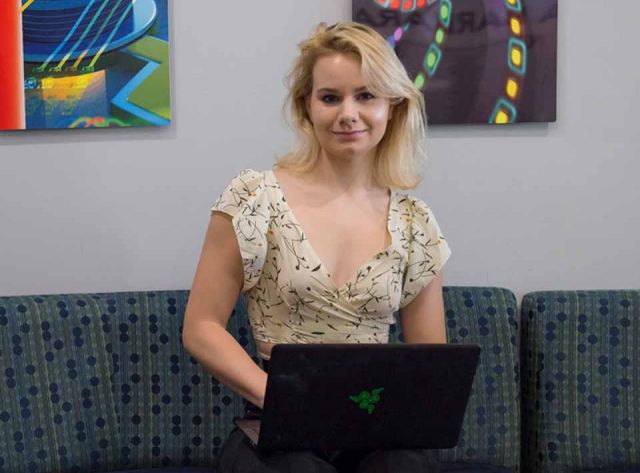 photo of Tegan Brennan in the COE lobby