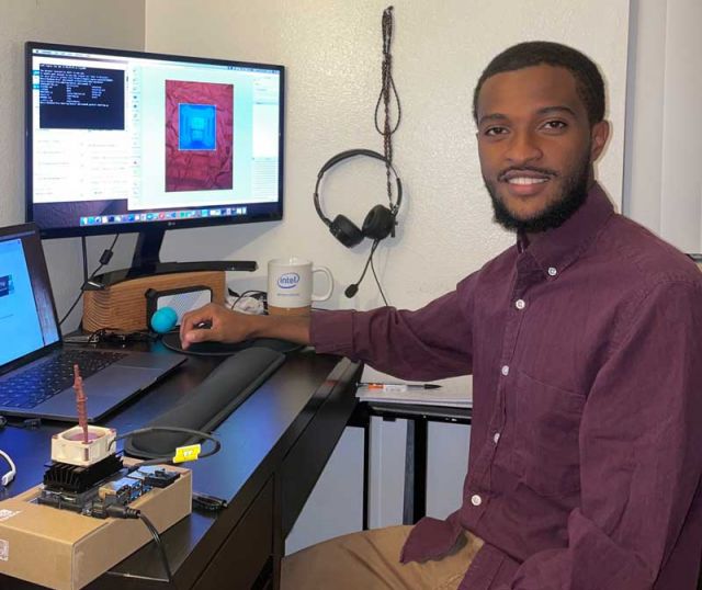 photo of semma at his desk
