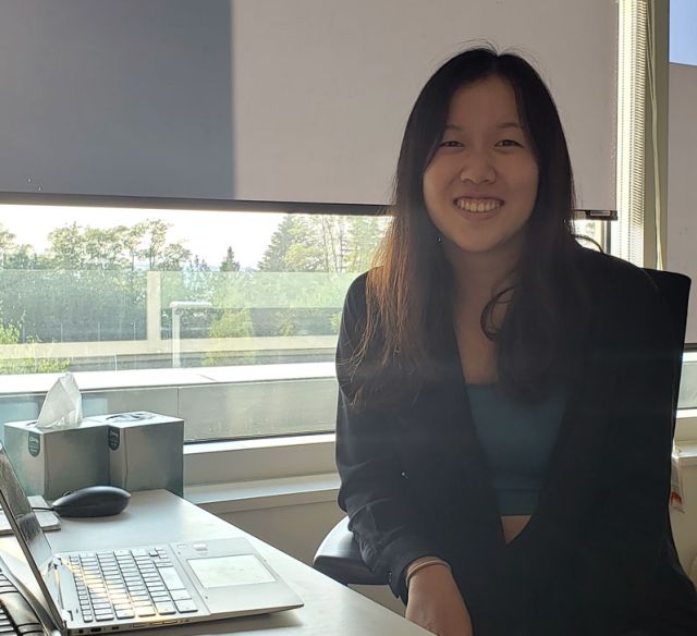 photo of anna at her desk