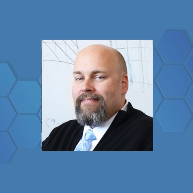 headshot of tim sherwood